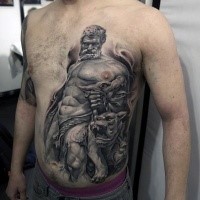 Ancient like colored chest and belly tattoo of statue with Cerberus