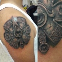 Ancient like colored shoulder tattoo of Mayan statue