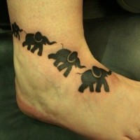 Ancient wall paintings like black ink animal elephants tattoo on leg