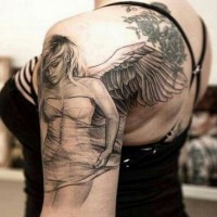 Angel woman with wings tattoo on shoulder