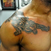 Angry panther tattoo on shoulder