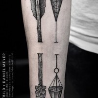 Antic like great designed black and white arrows tattoo on arm