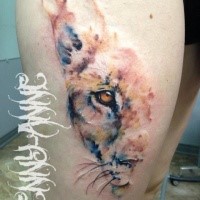 Art style colored thigh tattoo of lion head half