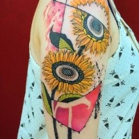 Art style colored upper arm tattoo of large flowers by Dino Nemec