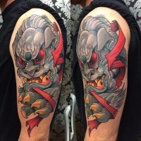 Asian style 3D like colorful shoulder tattoo of demonic tiger