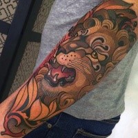 Asian style colored arm tattoo of lion with leaves