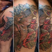Tatuaje en el muslo, 
Godzilla divertida en llamas de dibujos animados