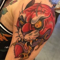 Asian style colored crazy looking shoulder tattoo of evil tiger