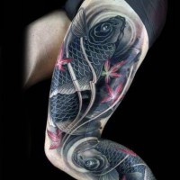Asian style colored very detailed sleeve tattoo of carp fishes stylized with leaves