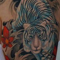 Asian style colorful shoulder tattoo of white tiger with wildflowers