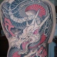 Asian style half colored big detailed dragon tattoo on whole back