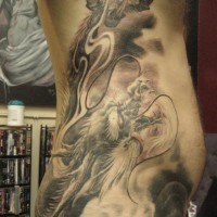 Asian style multicolored evil dragon in clouds tattoo on side