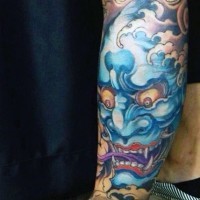 Asian style multicolored female demon tattoo on leg