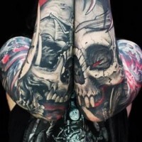 stile Asiatico multicolore cranio di mostro tatuaggio ambedue braccia