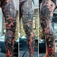 Asian themed massive colorful on leg tattoo of various samurai masks with flowers