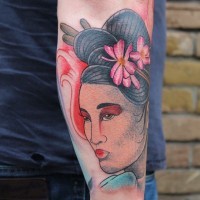 Attractive Asian Geisha with flowers in hairdo colored arm tattoo