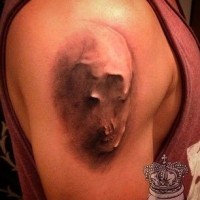 Awesome 3D like creepy under-skin skull tattoo on shoulder