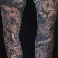 Tatuaje en el brazo completo, animales de gran tamaño