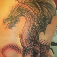 Awesome big dragon tattoo on ribs