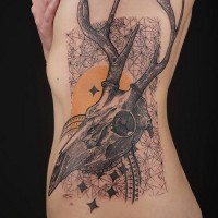 Awesome black and white big detailed animal skull with ornaments tattoo on side