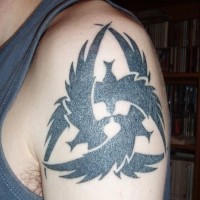 Awesome black ink crows irish tattoo on shoulder