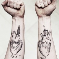 Awesome black ink hearts forearm tattoo by Lea Nahon