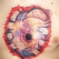 Awesome bullet hole in heart tattoo on chest