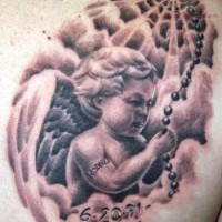 Awesome cherub baby memorial tattoo