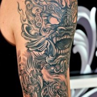 Awesome chinese lion tattoo on half sleeve