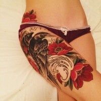 Awesome color flowers with raven tattoo on leg