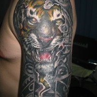 Awesome coloured tiger tattoo on half sleeve