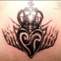 Awesome crown with irish clover tattoo