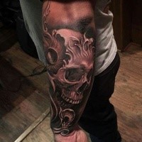 Awesome detailed arm tattoo fo fantasy skull