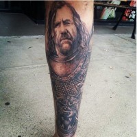 Awesome detailed black ink leg tattoo of medieval warrior