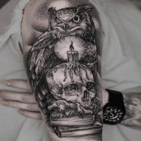 Awesome dotwork style upper arm tattoo of owl with human skull and candle