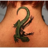 Awesome green black lizard tattoo on back