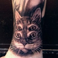 Awesome holographic cat tattoo by Mike Riina