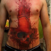 Tatuaje de cráneo de tinta roja en el estómago