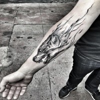 Awesome looking black ink forearm tattoo of wolf head by Inez Janiak