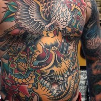 Awesome massive multicolored eagle fighting the snake tattoo on whole chest and belly