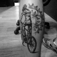 Awesome modern bike rider tattoo on leg
