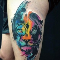 Awesome multicolored big lion face tattoo on thigh