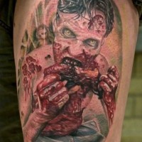 Awesome multicolored bloody eating zombie tattoo on shoulder