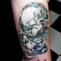 Awesome multicolored realistic diamonds tattoo on ankle