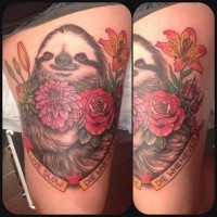 Awesome painted big colored sloth with flowers and lettering tattoo on thigh