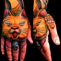 Awesome portrait of a japanese cat tattoo on hand