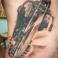 Awesome racer on a motorcycle tattoo on ribs