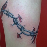 Awesome ripped skin barbed wire tattoo