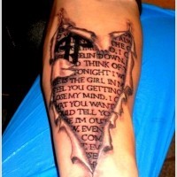 Awesome sacred texts under skin rip forearm tattoo
