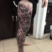 Awesome samurai in mask tattoo on leg